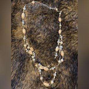 Beautiful silver medium length necklace in cream beads